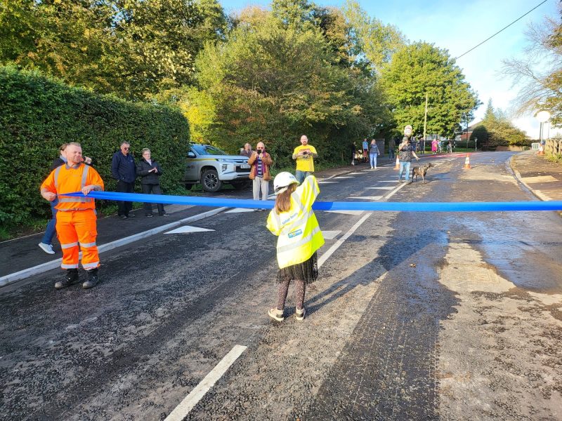 A young local resident reopens the road at Kilkern Civil Engineering's completed works at Soot Hill, Northwich, Cheshire.